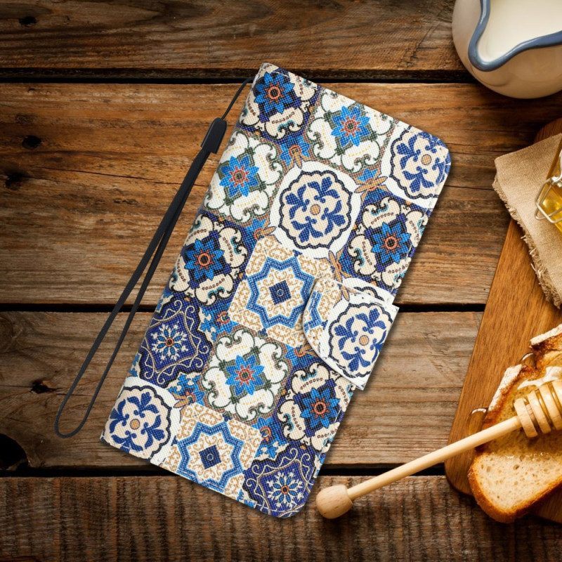 Flip Case voor iPhone 15 Met Ketting Blauw Patchwork Met Riempje